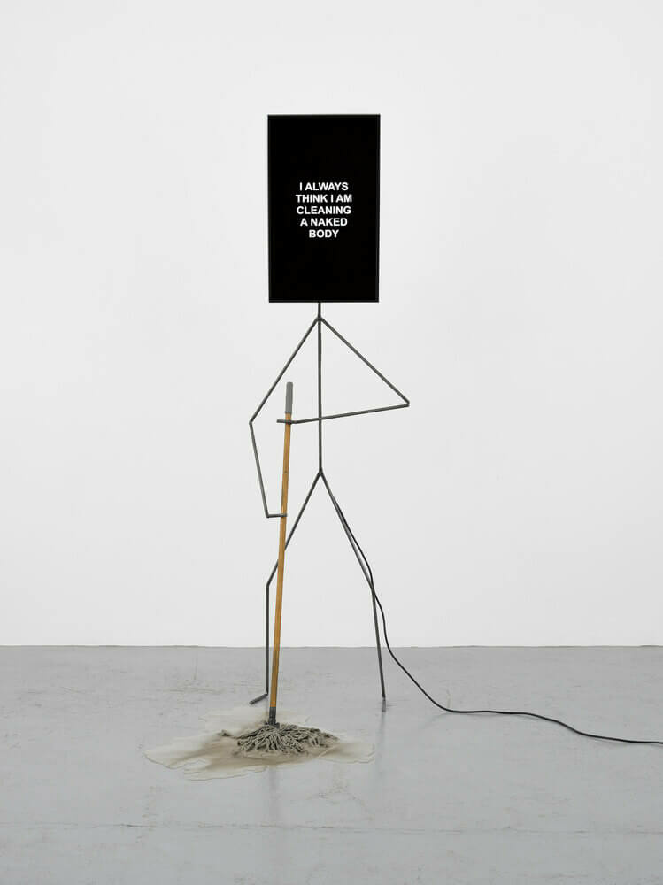 Metal Man cleaning the floor